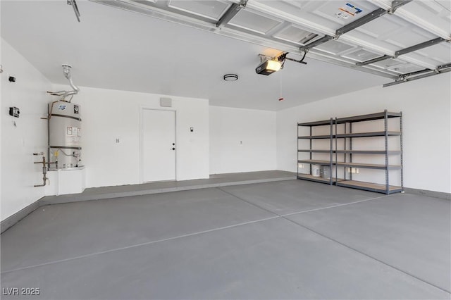 garage featuring a garage door opener and water heater