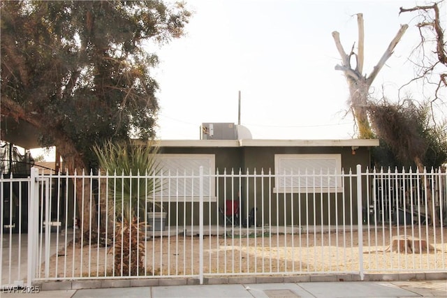 view of gate with a garage