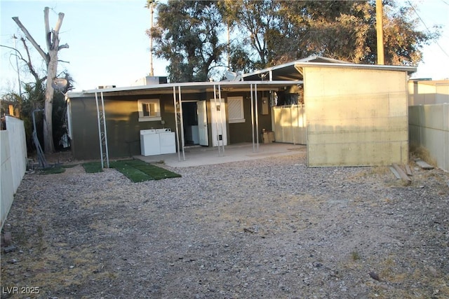 back of house featuring a patio area