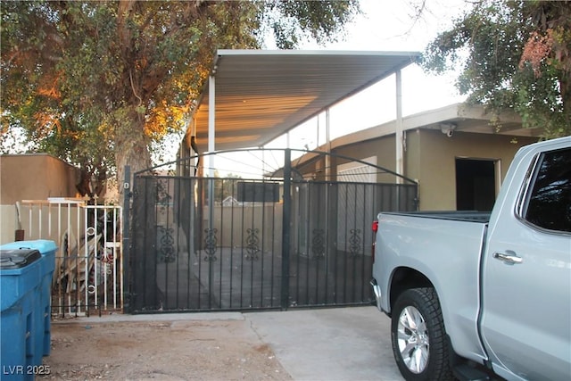 view of side of property with a carport