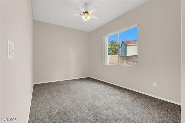 empty room with ceiling fan and carpet flooring