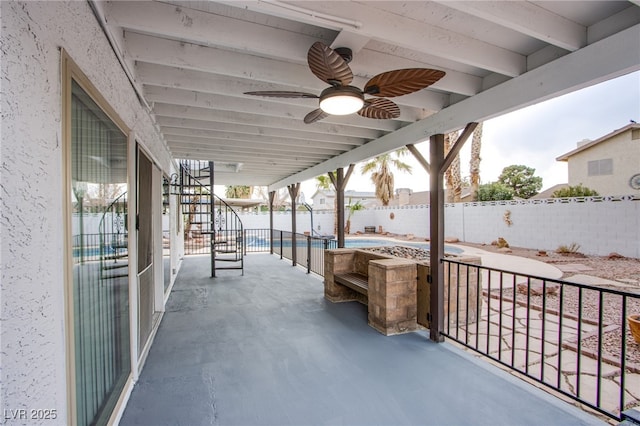 view of patio / terrace with a fenced in pool