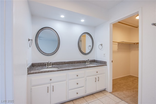 bathroom with vanity and tile patterned flooring