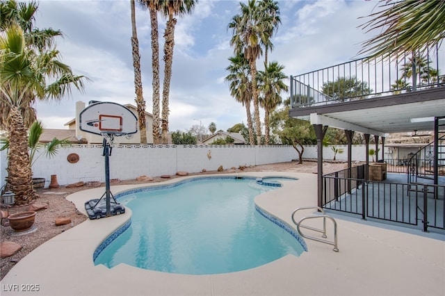 view of pool featuring a patio