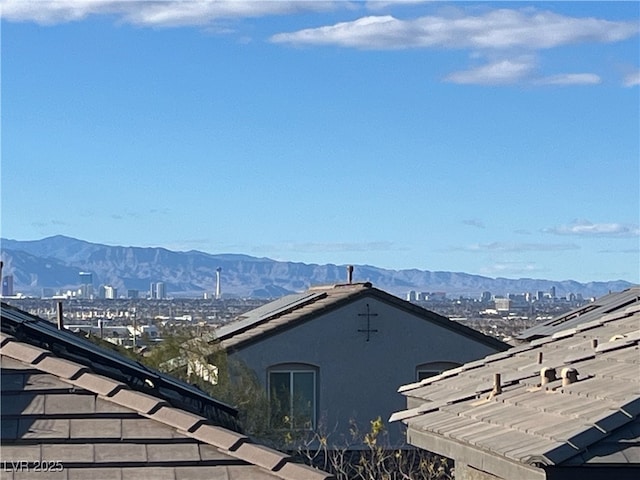 view of mountain feature with a view of city