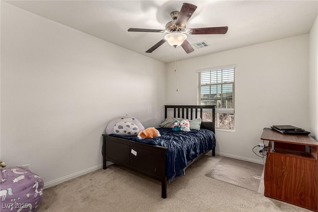 bedroom with light colored carpet and ceiling fan