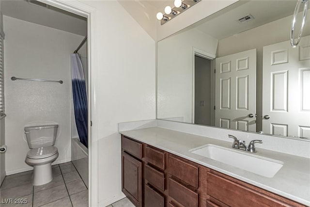 full bathroom with tile patterned floors, toilet, vanity, and shower / bath combo