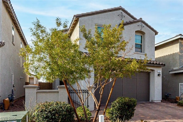 view of front of property featuring a garage