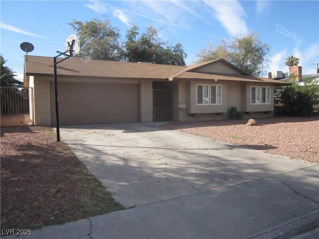 single story home featuring a garage