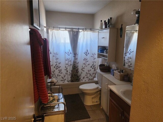 full bathroom with tile patterned flooring, vanity, toilet, and shower / bath combo with shower curtain