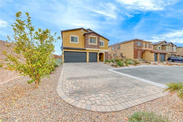 view of front of property with a garage