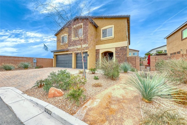 front facade with a garage