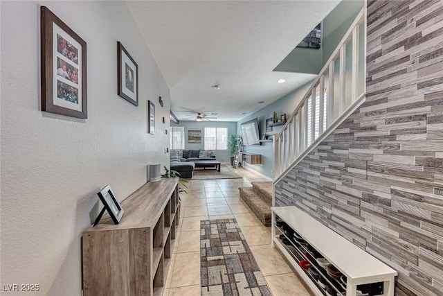 hallway with light tile patterned floors