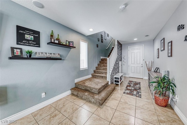 view of tiled foyer entrance