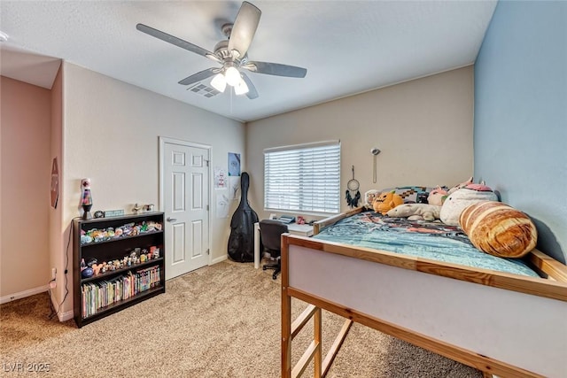 bedroom featuring light colored carpet and ceiling fan