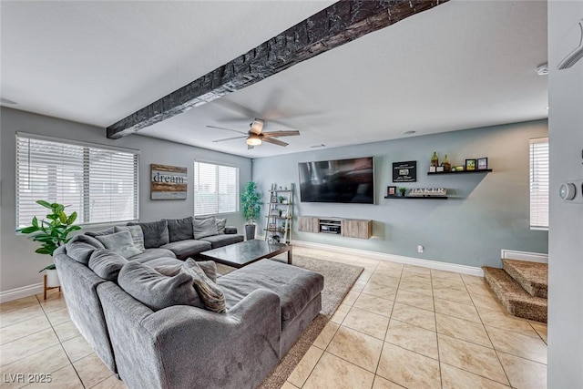 living room with light tile patterned floors, beamed ceiling, and ceiling fan