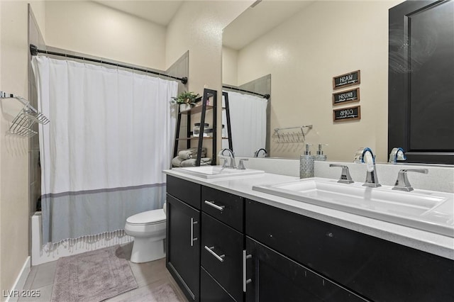 full bathroom featuring shower / tub combo with curtain, vanity, and toilet