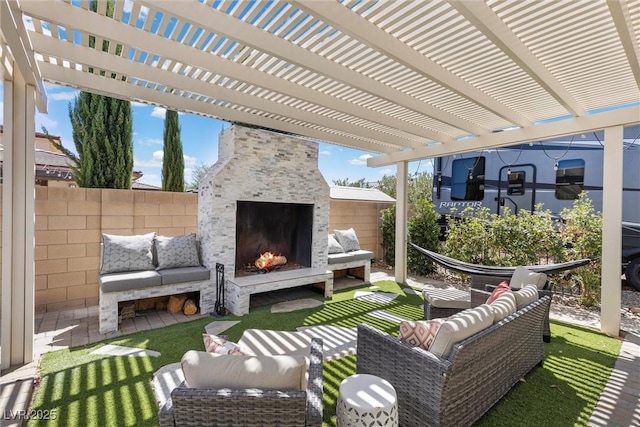 view of patio featuring an outdoor living space with a fireplace and a pergola