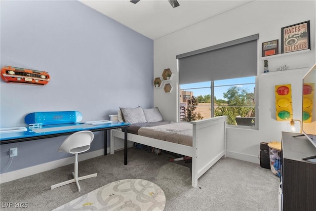 bedroom with light carpet and ceiling fan