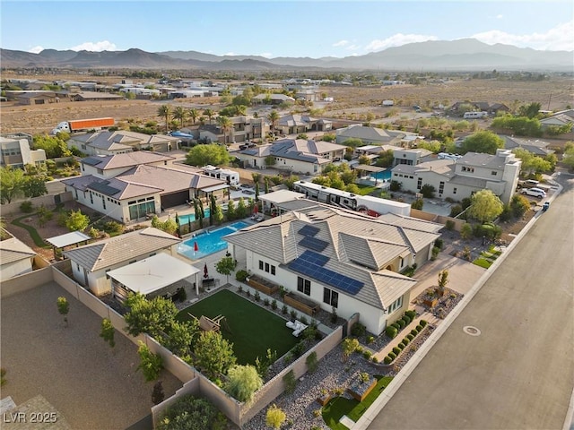 drone / aerial view featuring a mountain view