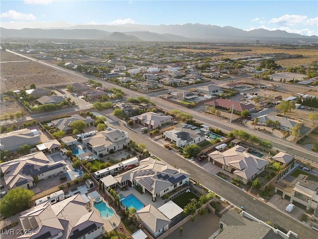 bird's eye view with a mountain view