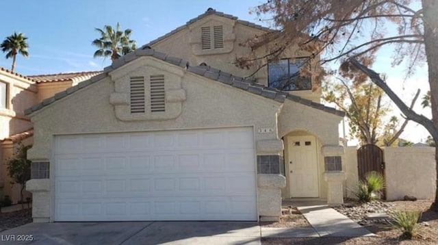 view of front of property featuring a garage