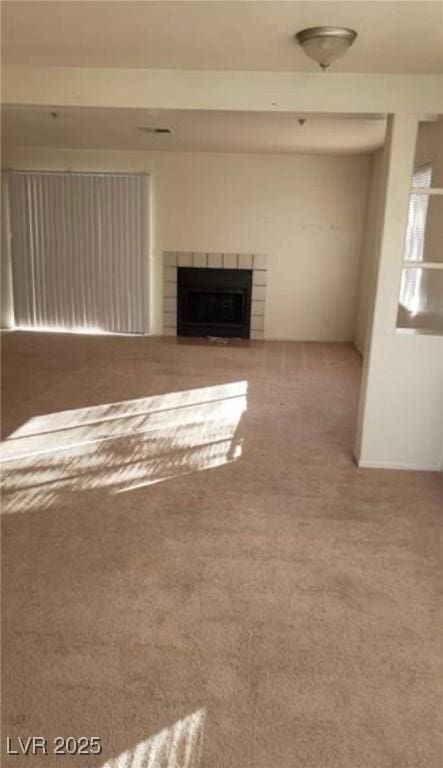 unfurnished living room with carpet floors