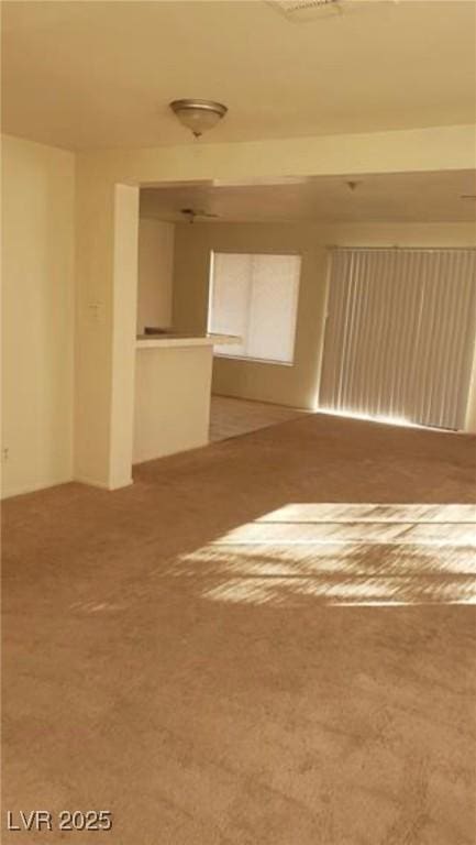 spare room featuring carpet flooring