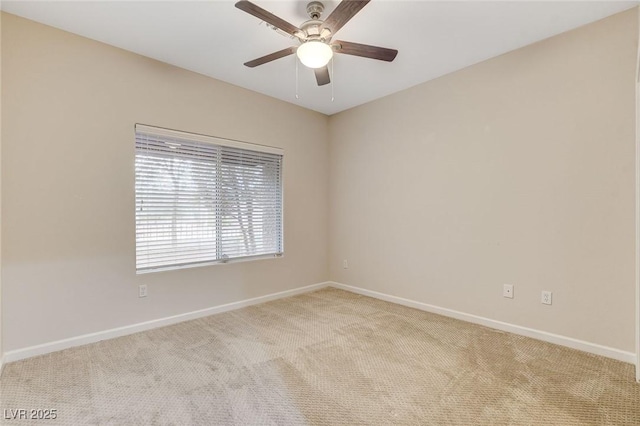 empty room with light carpet and ceiling fan