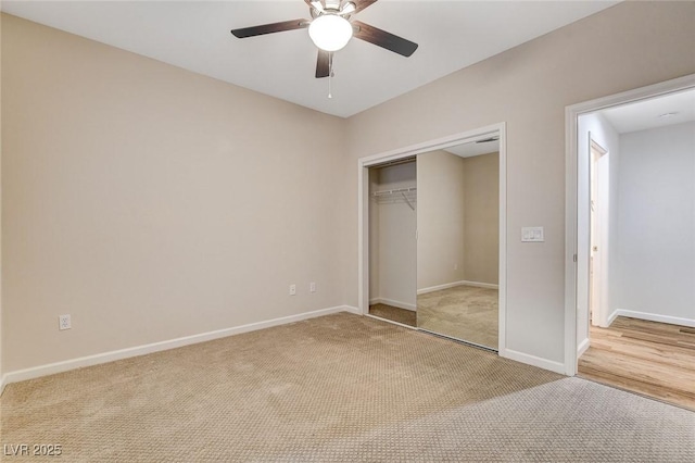 unfurnished bedroom featuring light colored carpet, ceiling fan, and a closet