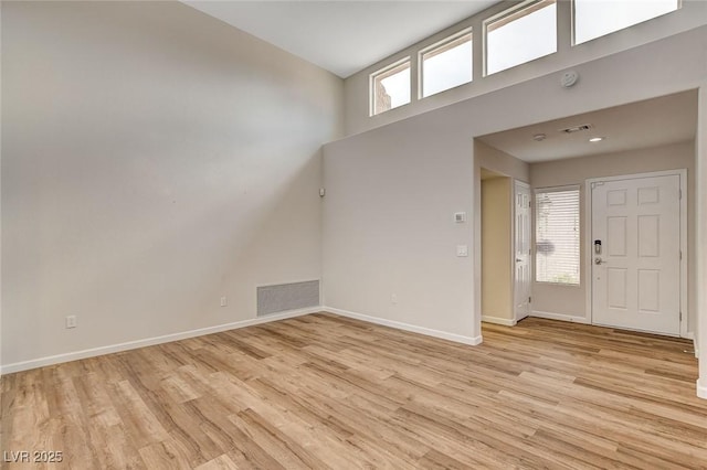 entrance foyer featuring light hardwood / wood-style floors