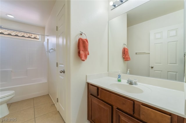 full bath with tile patterned floors, shower / bath combination, vanity, and toilet