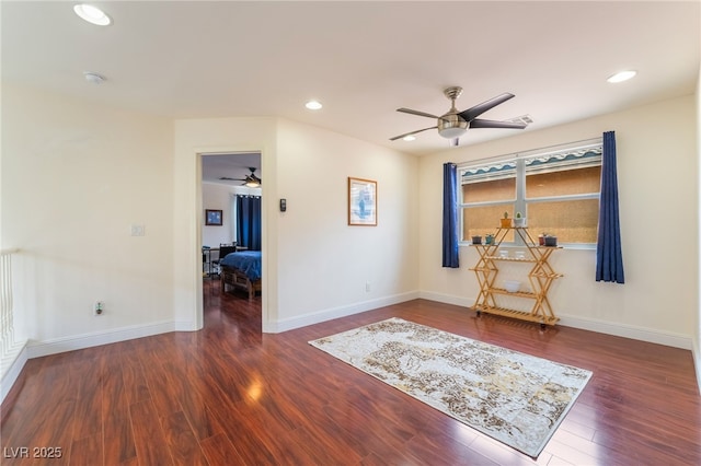 unfurnished room with recessed lighting, wood finished floors, visible vents, a ceiling fan, and baseboards