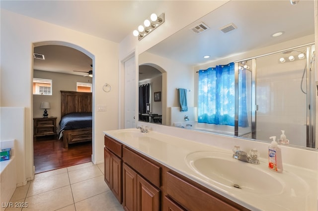 full bath with tile patterned floors, a sink, and visible vents