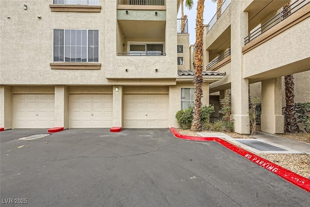 view of building exterior with a garage