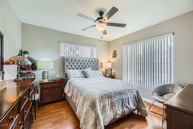 bedroom featuring ceiling fan and light wood-type flooring