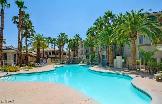 view of swimming pool with a patio