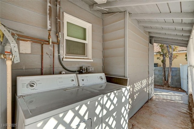 laundry area with separate washer and dryer