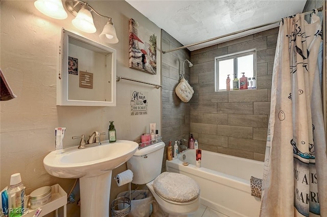 bathroom featuring shower / bath combination with curtain and toilet