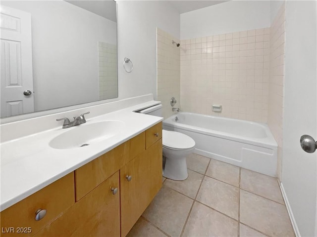 full bathroom with bathtub / shower combination, tile patterned floors, toilet, and vanity