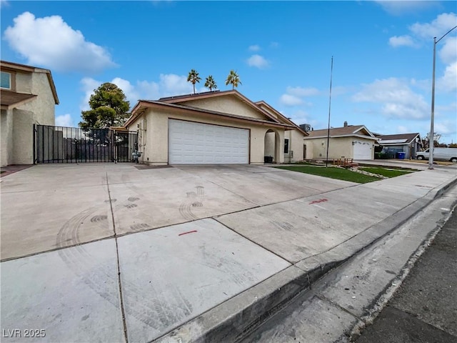 ranch-style home with a garage