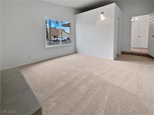 spare room featuring carpet flooring