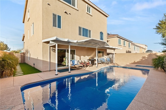 view of swimming pool with a patio, a fenced backyard, a fenced in pool, and a pergola