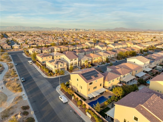 drone / aerial view with a mountain view and a residential view