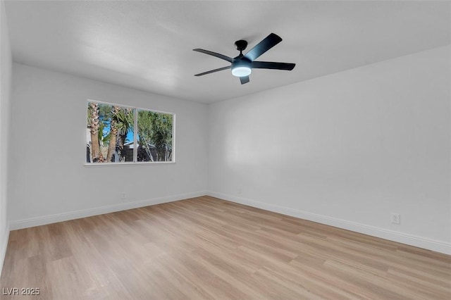 empty room featuring light hardwood / wood-style floors and ceiling fan