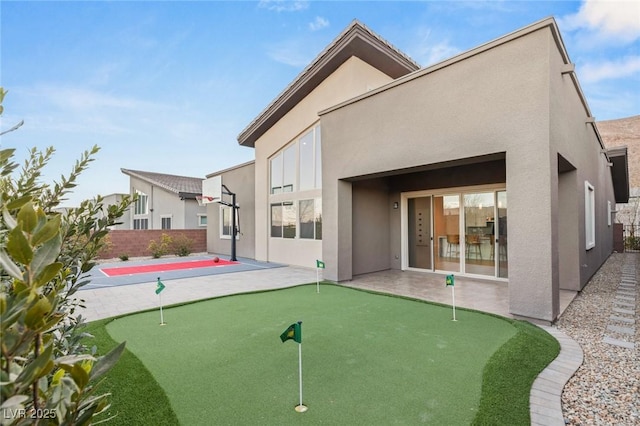 rear view of house featuring a patio area