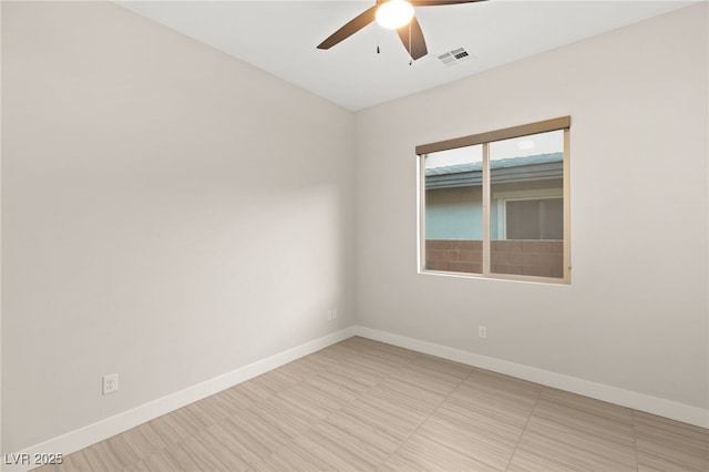 empty room featuring ceiling fan