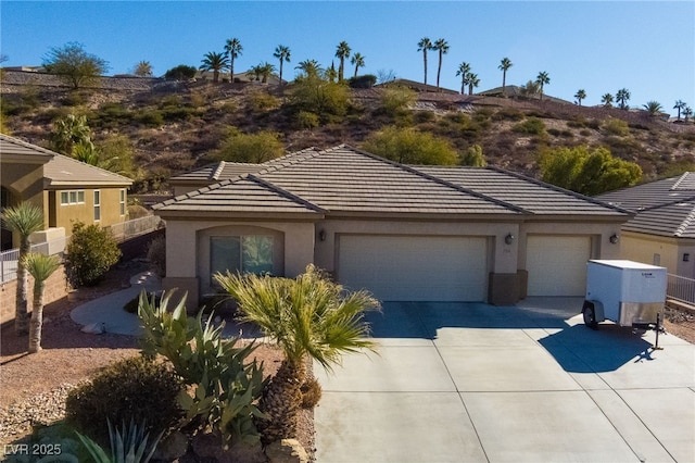 view of front of home featuring a garage