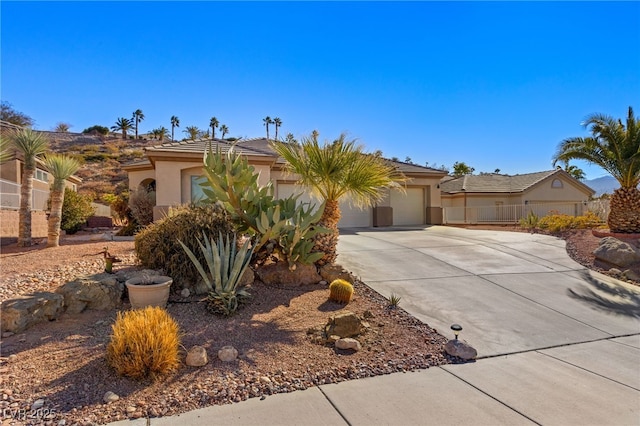 ranch-style house featuring a garage