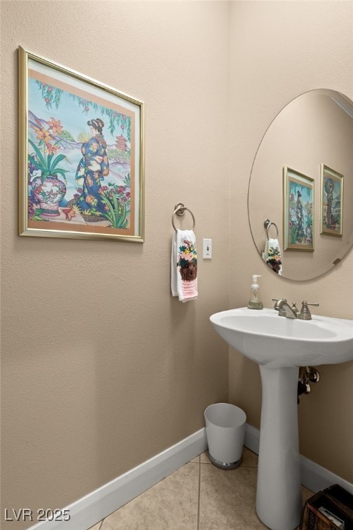 bathroom with sink and tile patterned floors